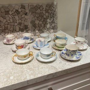 Eleven teacups and saucers